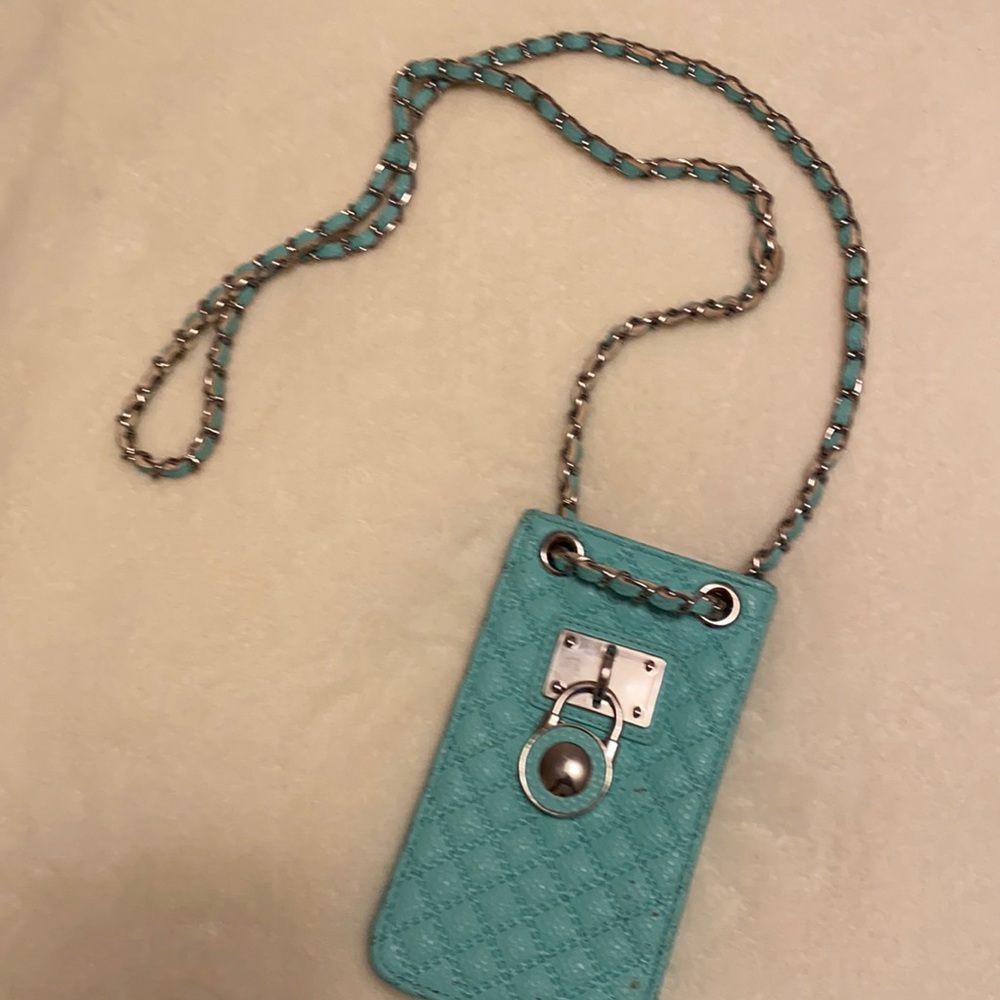A cute turquoise crossbody wallet for small things